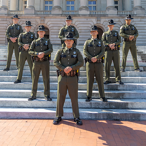 Fish and Wildlife Officers in front of the State Capitol Building